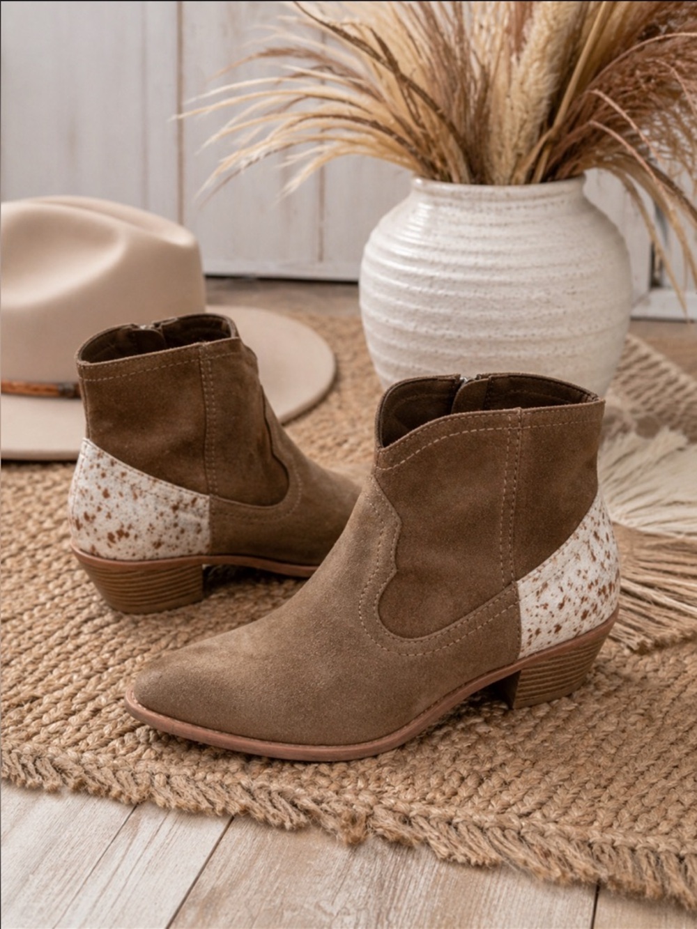 Dolce Vita Senica booties in a saddle suede and cow print 6.5